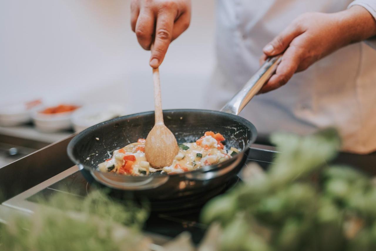 Hotel Miramare Crikvenica Ngoại thất bức ảnh A wooden spoon being used in a pan